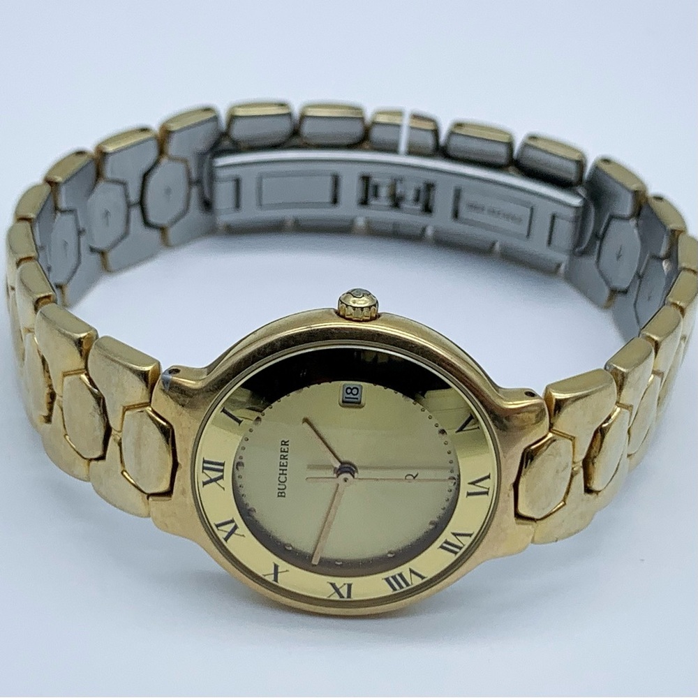 Gold Bucherer Watch with Roman Numerals